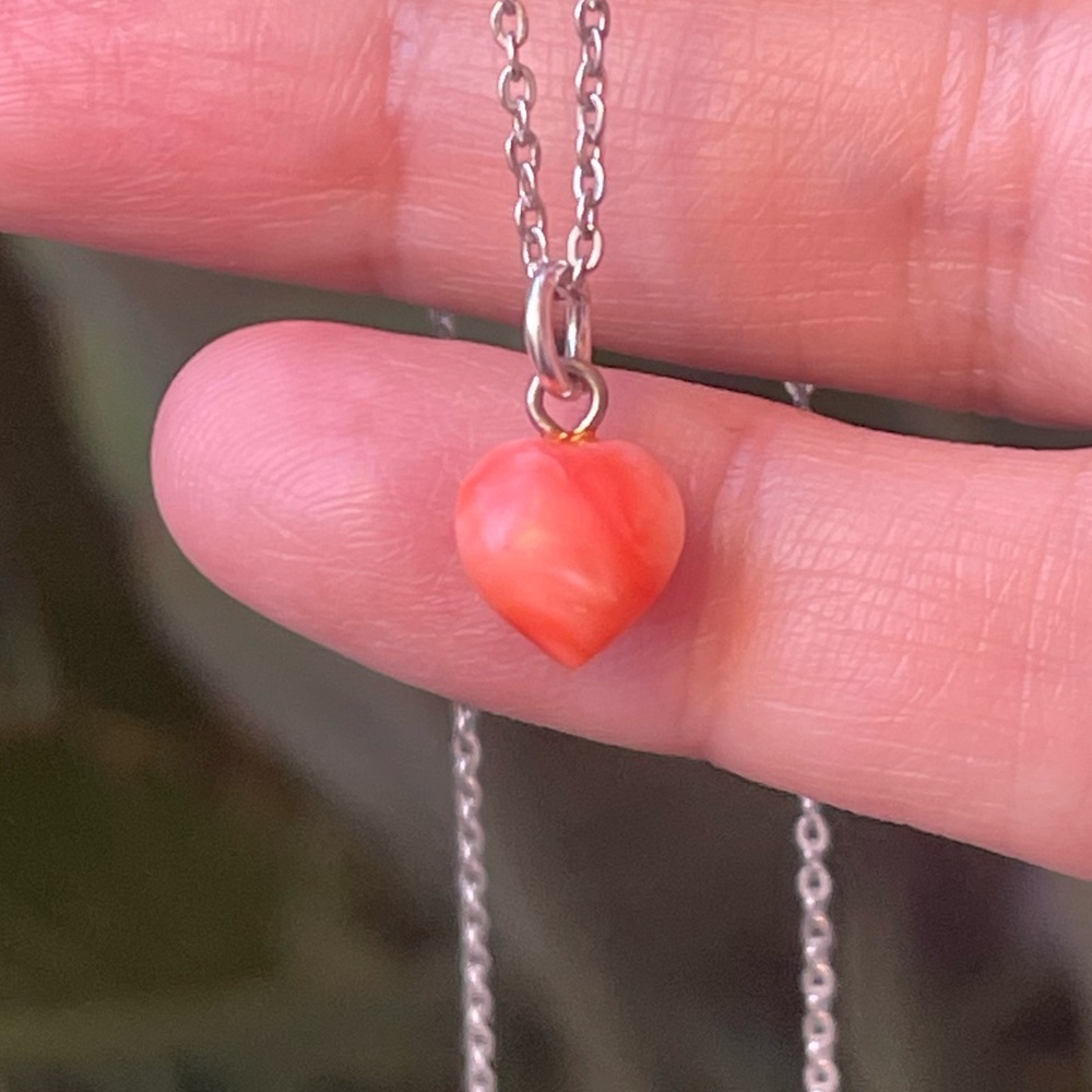 Carved natural angel skin salmon coral puffy heart silver tone pendant and chain